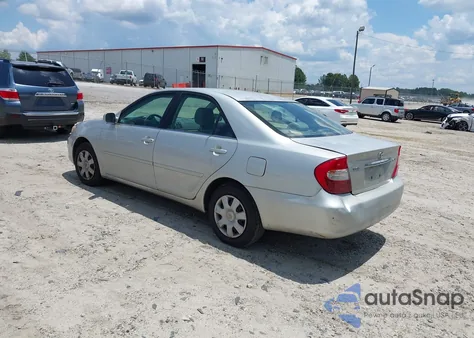 2003 Toyota Camry Le z USA, uszkodzony, nr VIN 4T1BE32KX3U698653